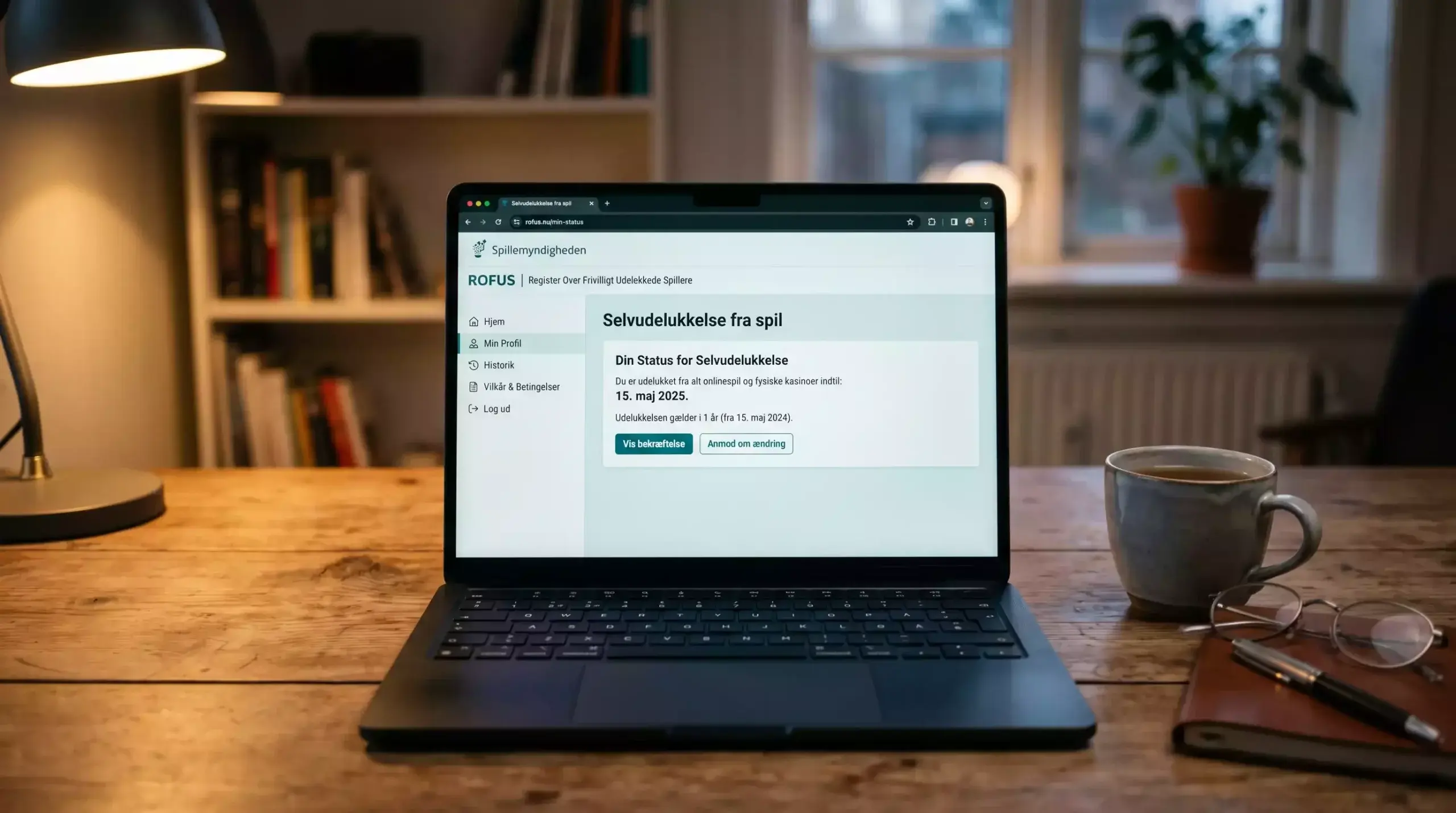 Skærm med ROFUS-registrering og spilkonto-pause